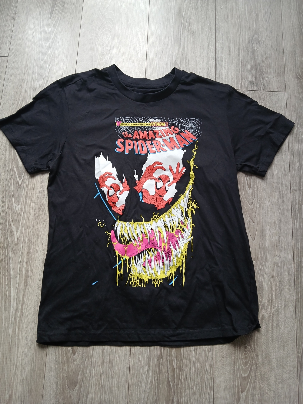 Marvel Black Graphic Crewneck Tee with Red and Yellow Accents